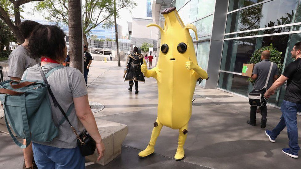 An actor dressed as Fortnite's Peely the banana character