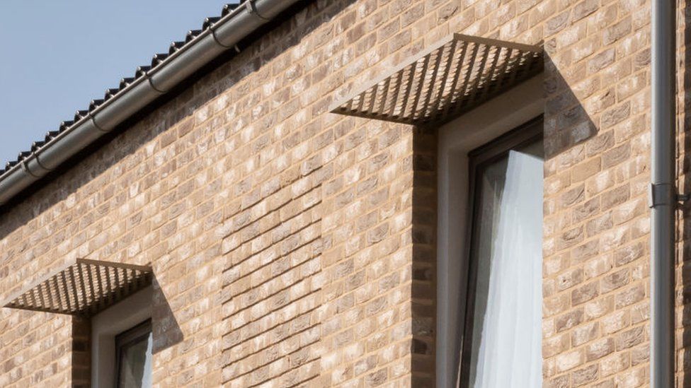 Goldsmith Street features overhangs that provide shade above windows