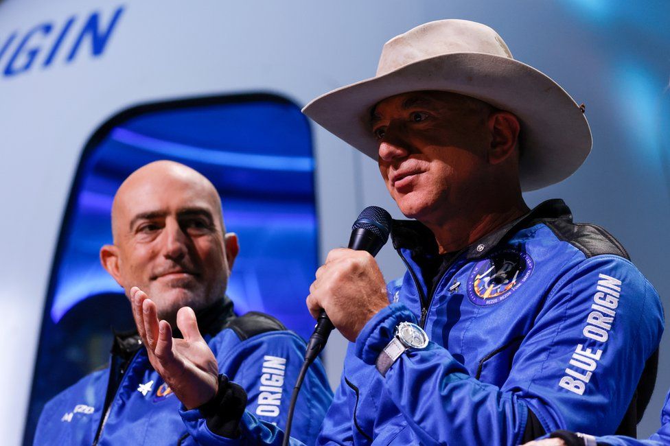 Mr Bezos flew to space with his brother Mark (L) last week, in the first crewed flight of his New Shepard spacecraft