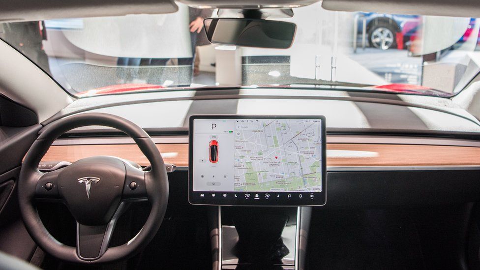 Image caption, Some Tesla drivers can opt in to the public beta testing for its new software