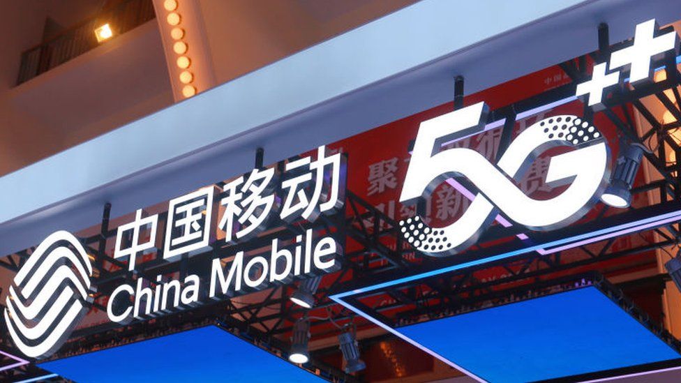 Акции China Mobile растут. Выставочная зона China Mobile на выставке China Independent Brands Expo в Шанхае, Китай.