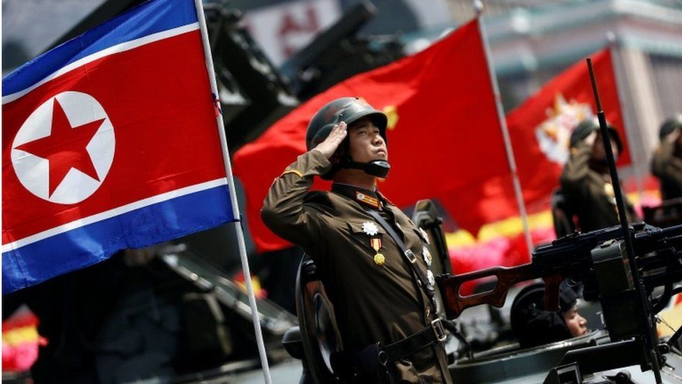 Korean People's Army soldier saluting during a parade for the "Day of the Sun" festival on Kim Il Sung Square in Pyongyang, North Korea, 15 April 2017.