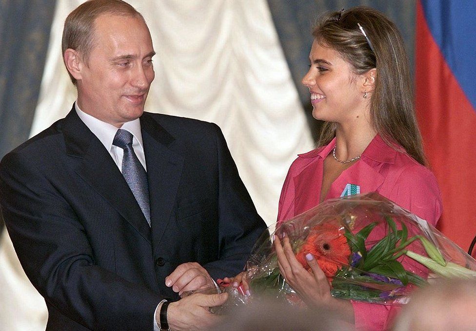 путин и Кабаева на церемонии в 2001 году