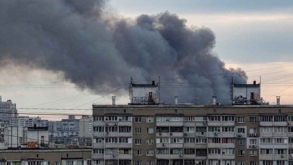 , Columns of dark smoke rose above Kyiv's skyline on Sunday