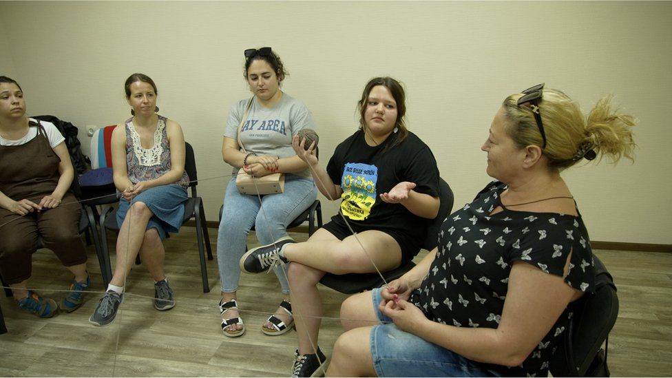 , Mariupol's survivors trying to cope with the death and destruction through group therapy.