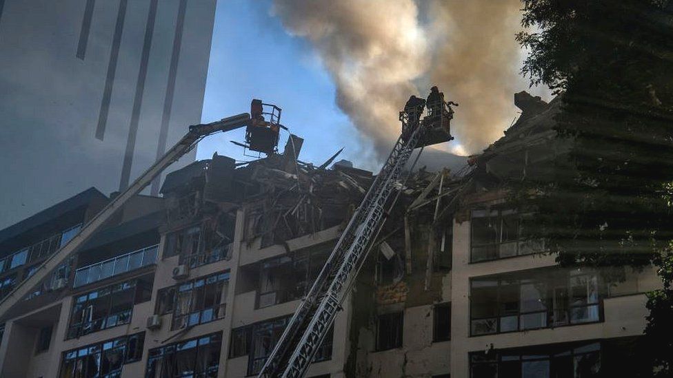, A Russian missile wrecked a nine-storey apartment block in central Kyiv