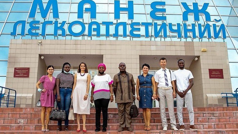 , Fehintola Moses Damilola, seen here on right with fellow students, had been in Ukraine since he was 17