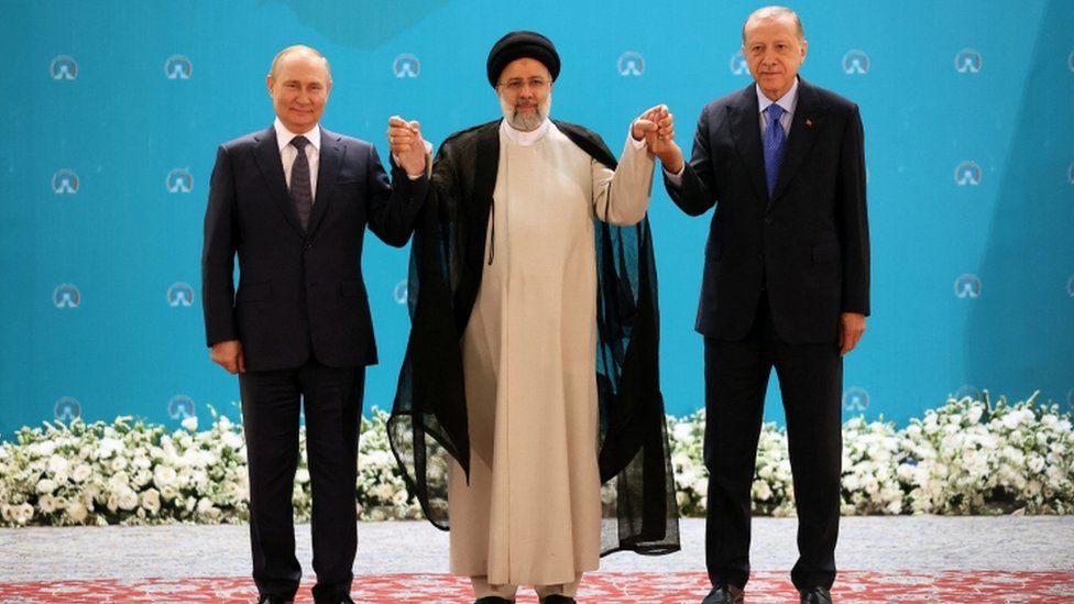 Vladimir Putin met his Iranian and Turkish counterparts in Tehran on Tuesday