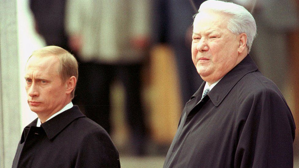 Boris Mints worked for Boris Yeltsin's (right) government, but was sacked by Vladimir Putin (left) days into his tenure