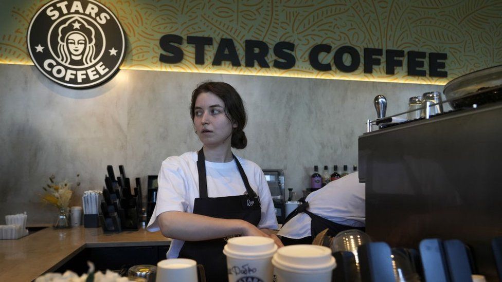 Starbucks. A worker prepares coffee at the newly-named Stars chain.