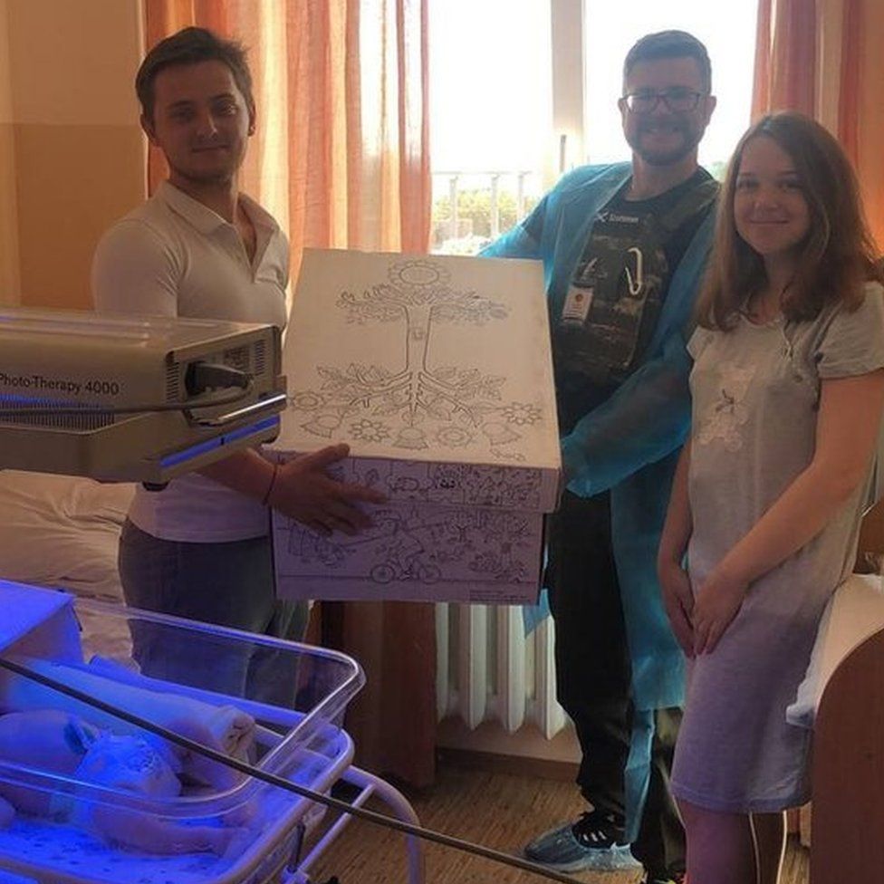 Oleg Dmitriev with new parents in Chuhuiv Maternity Hospital