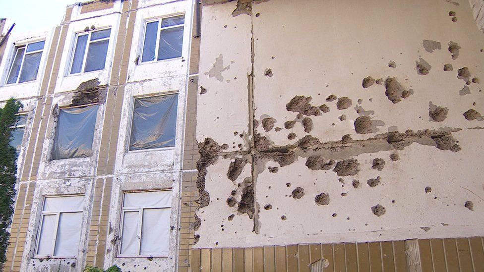 Some schools, like this one in Irpin, have visible scars from Russian shelling