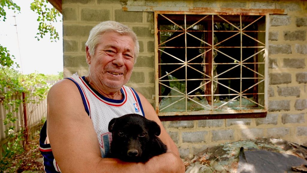Sergiy and his dog Mukha