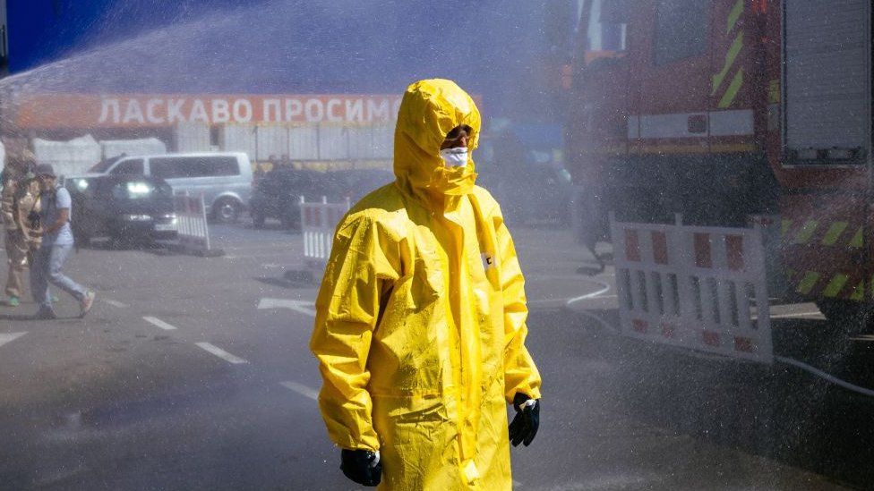 A Ukrainian Emergency Ministry rescuer attends an exercise in the city of Zaporizhzhia on 17 August 2022, in case of a possible nuclear incident at the Zaporizhzhia nuclear power plant located near the city.