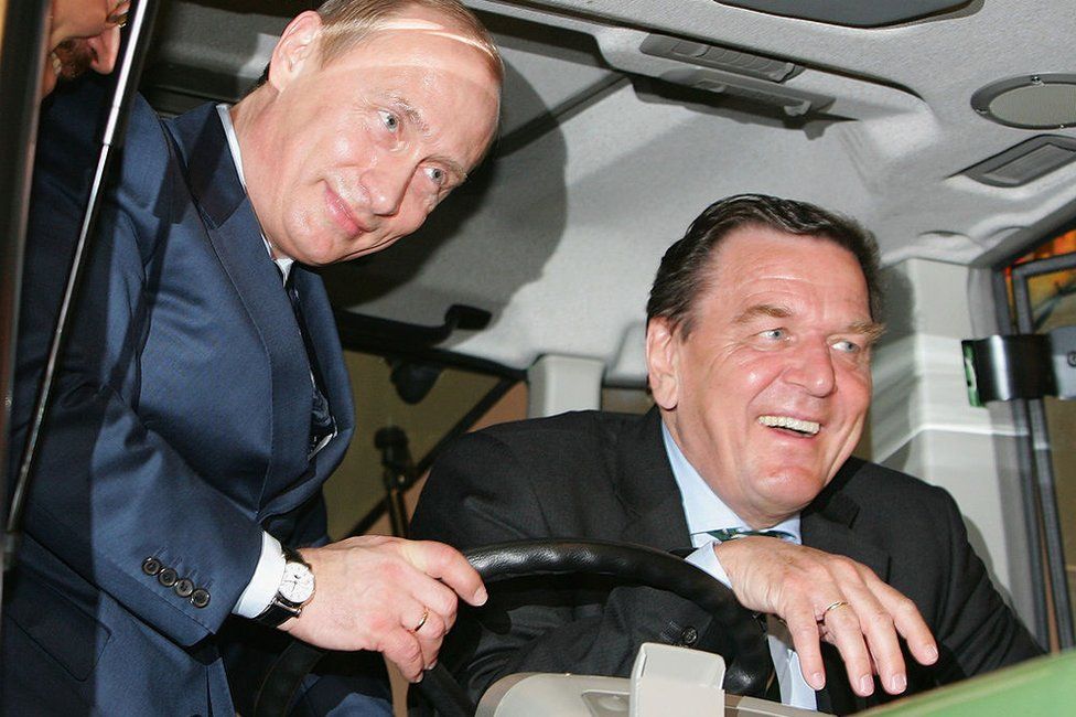 Trying out a Fendt tractor with the then German Chancellor, Gerhard Schroeder, at a trade fair in Hanover in 2005