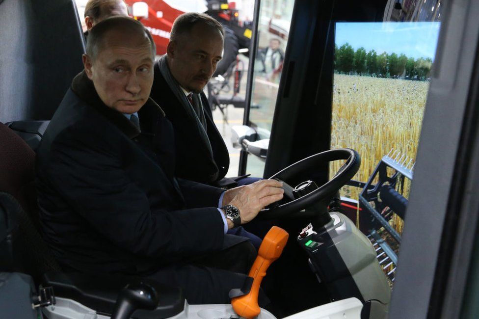 Experiencing a tractor simulator at a factory in Rostov-on-Don in 2018