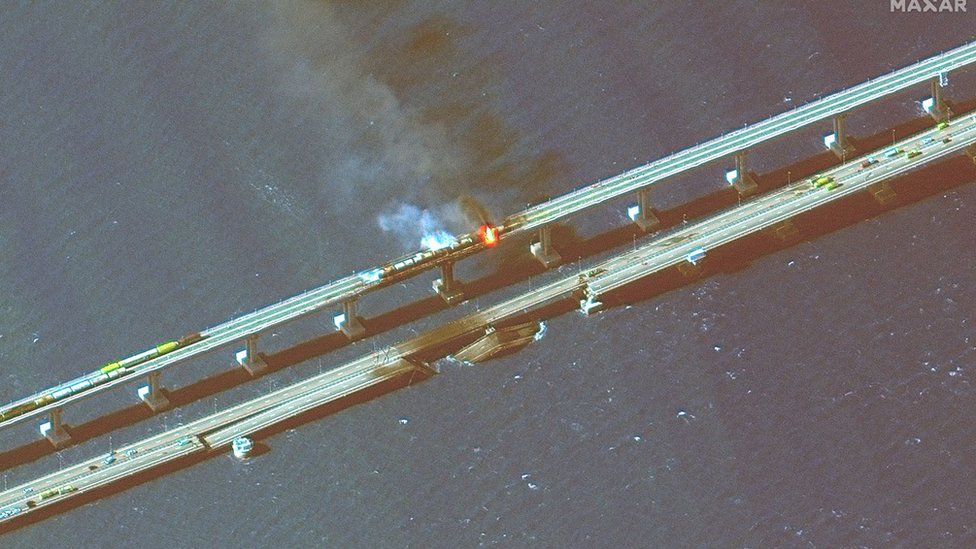 New satellite images taken by Maxar Technologies show smoke and fire following the explosion on the symbolic Crimean bridge.