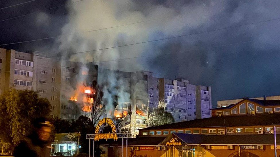 An apartment block in Russia's southern city of Yeysk was ablaze after a military aircraft crashed into the residential area