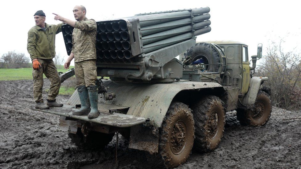 The artilleryman nicknamed Lysyi (R) says he is fond of the BM-21 Grad missile launcher, which is more than 50 years old