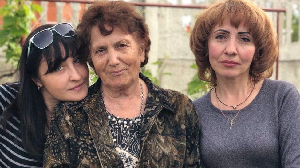 Olga Sagirova (L) with her mother and sister, whose bodies - like thousands in Mariupol - are unaccounted for