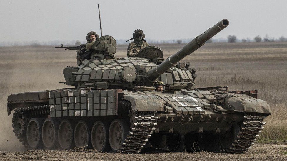 A Ukrainian tank moves forward in an advance on the city of Ukraine