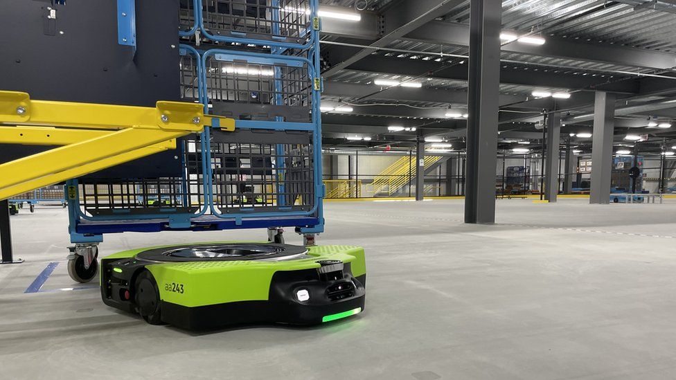 Amazon is working to expand automation in its warehouses as it faces pressure to cut costs