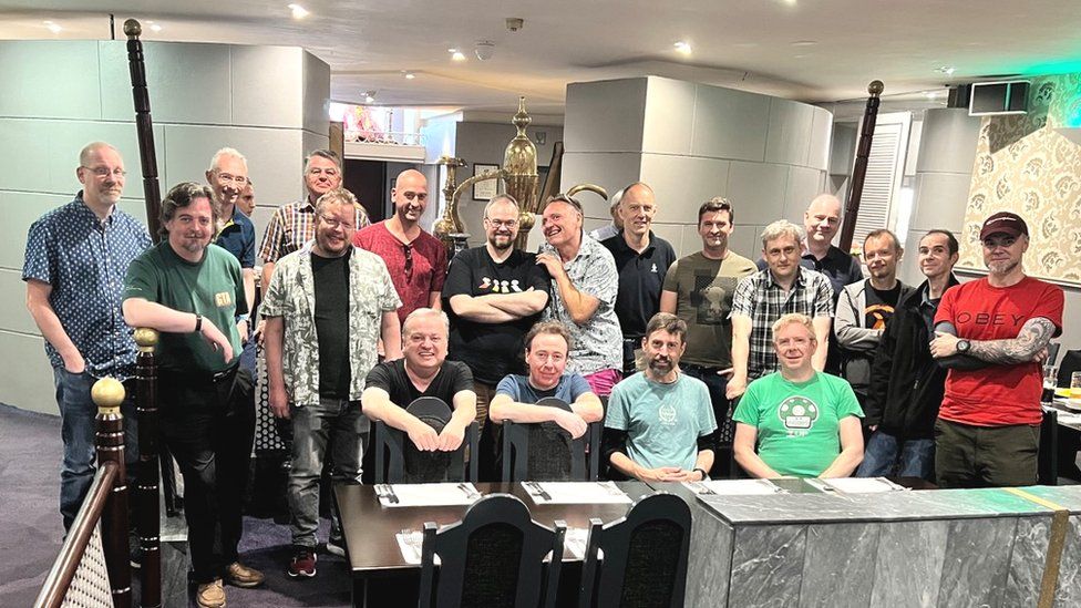 Members of the original DMA Design team, including those who worked on GTA 1, pictured at a reunion earlier this year