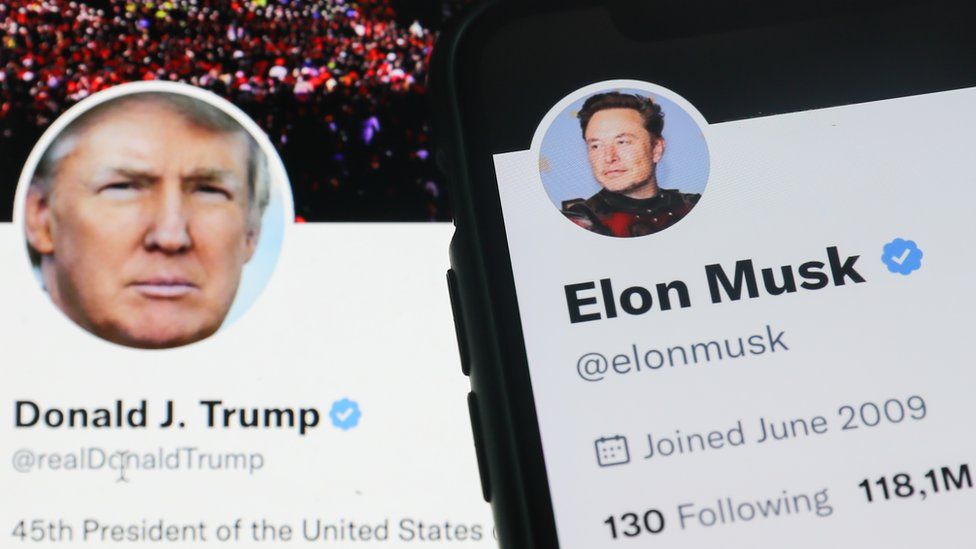 Donald Trump Twitter account displayed on a laptop screen and Elon Musk Twitter account displayed on a phone screen are seen in this illustration photo taken in Krakow, Poland on November 22, 2022