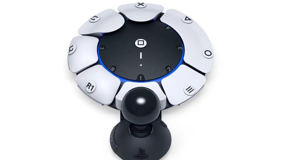 Sony's new controller, a disc shape with a joystick and several numbered buttons