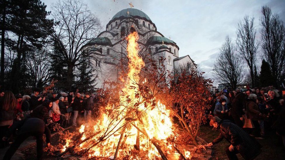 In Serbia, people attended the annual bonfire of dried oak branches - the badnjak - the at the Church of Saint Sava in Belgrade. The fire symbolises that built by the shepherds to warm the baby Jesus in his manger.