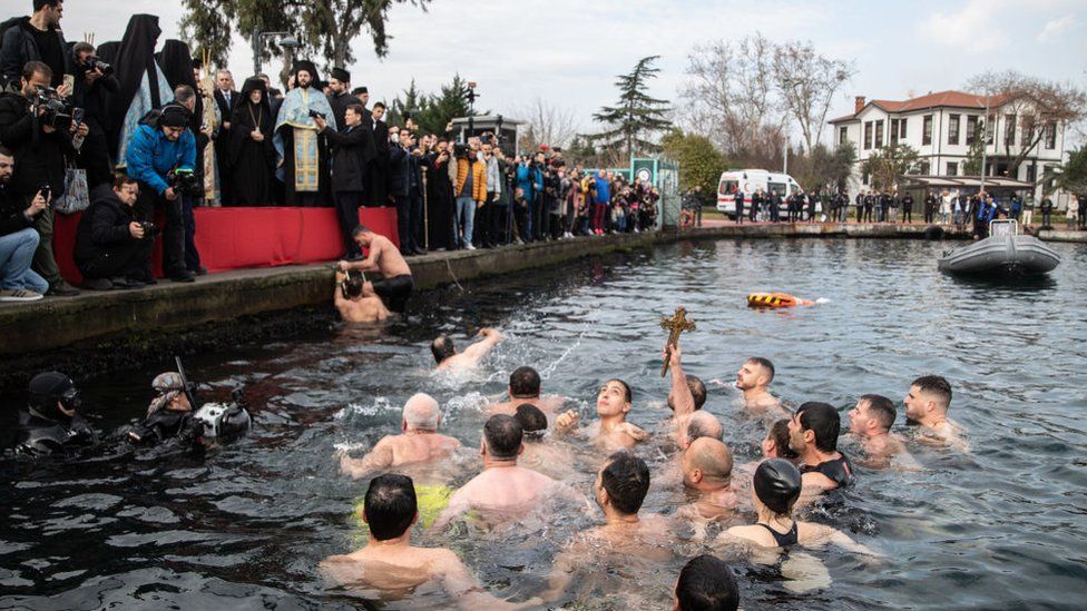 Greek Orthodox Christians now celebrate Christmas on 25 December but Friday was still a special day - the Feast of the Epiphany. These believers held up a wooden cross after retrieving it from the waters of the Golden Horn in Istanbul, Turkey.