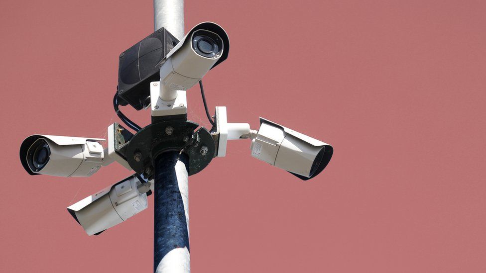 A stock illustration of surveillance cameras