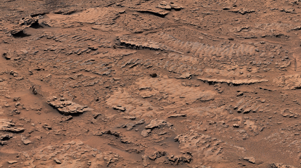 Curiosity находит неожиданные подсказки о водном прошлом Марса 1 Рифленые текстуры горных пород: Миллиарды лет назад волны на поверхности мелкого озера взбаламутили осадок на его дне. Со временем осадок сформировался в породы с рябой текстурой, которые являются самым четким свидетельством волн и воды, когда-либо обнаруженным марсоходом НАСА Curiosity.
