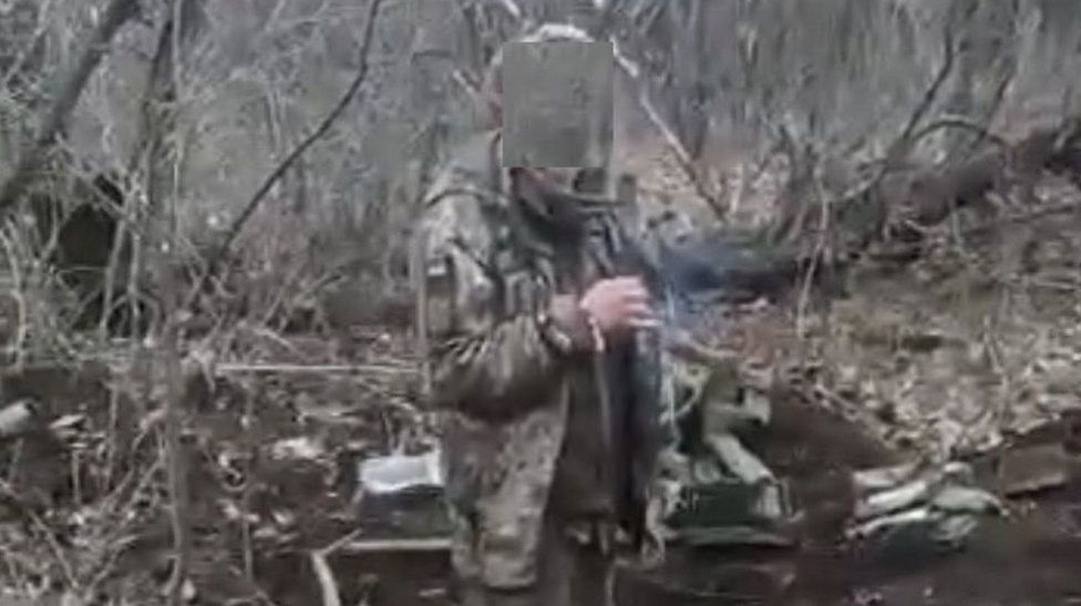A screenshot from the video purportedly showing the Ukrainian prisoner of war before he was shot dead