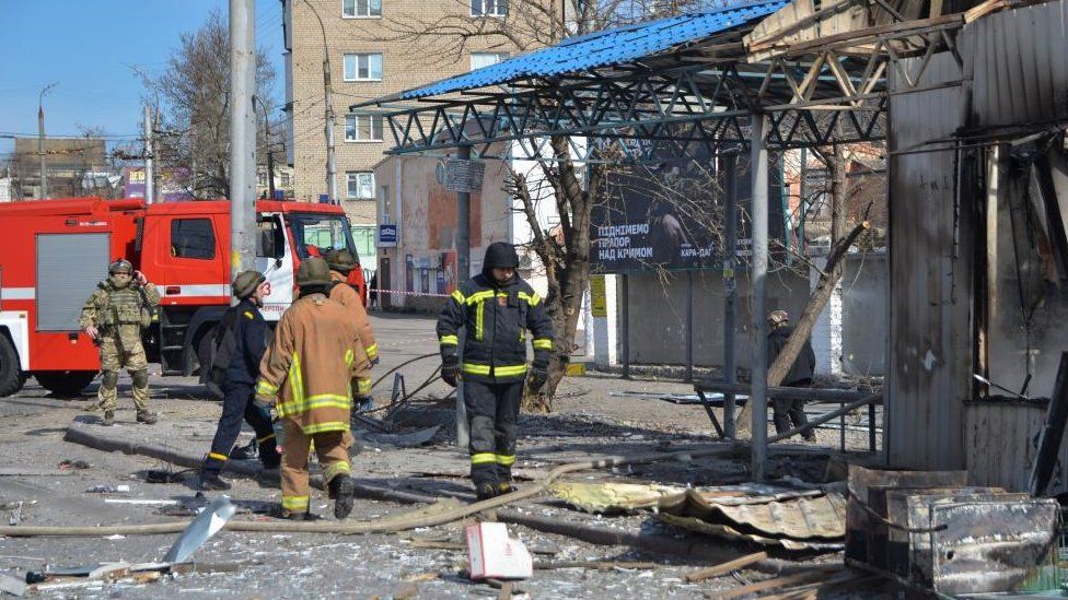 Three people are reported to have died after a strike hit a bus stop in Kherson