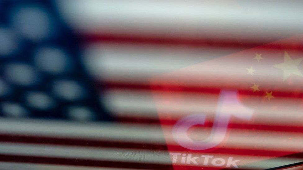 TikTok reflection in US and China flag