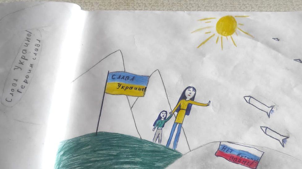 Masha's school contacted the police, her father said, after the 12-year-old drew this picture