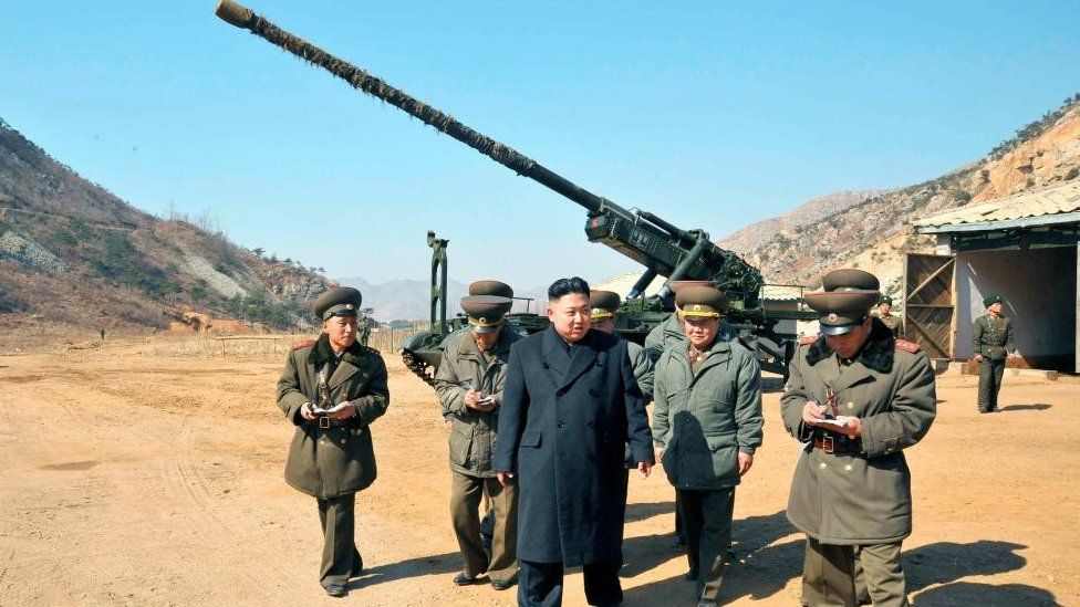 North Korean leader Kim Jong-Un stands in front of a long-range artillery sub-unit this month. It is not known if this is a weapon sought by Russia