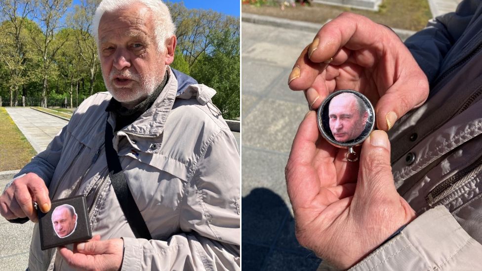 Alexander shows personal items decorated with portraits of Putin, he says he believes Russia is fighting fascism in Ukraine