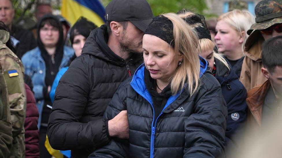 Serhii (left) and Lilia were supported by the entire town at their older son's funeral