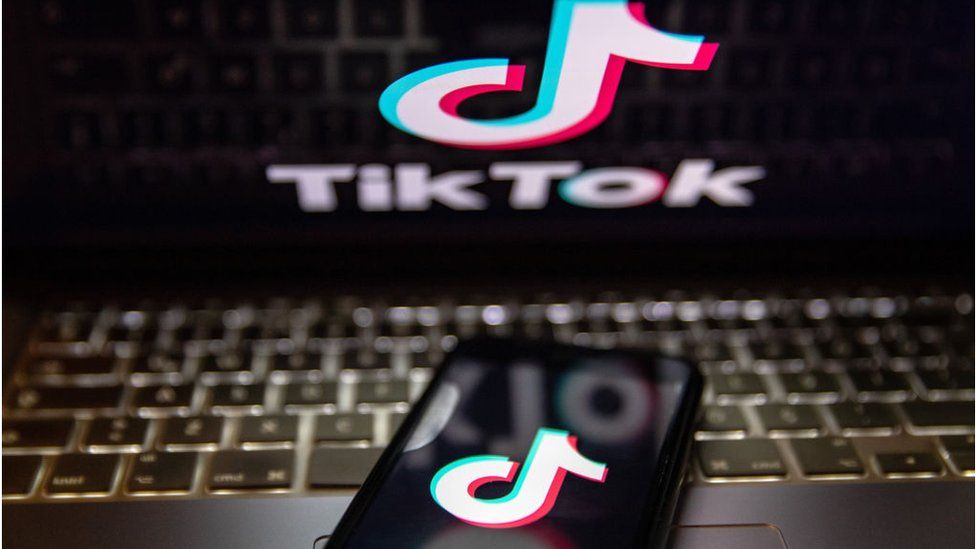 TikTok logo and screen