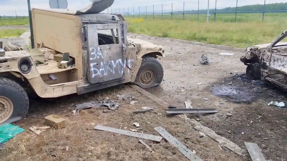 Another Russian photo showed a wrecked vehicle with the words "for Bakhmut" written in Russian on the side