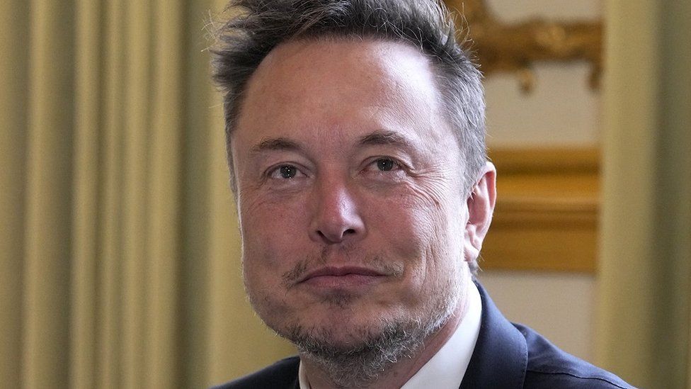 Elon Musk - who took over Twitter last October - pictured in Paris earlier this month