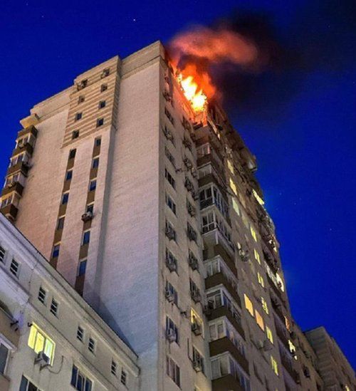 Two upper floors of a high-rise building were destroyed in Kyiv, local officials say