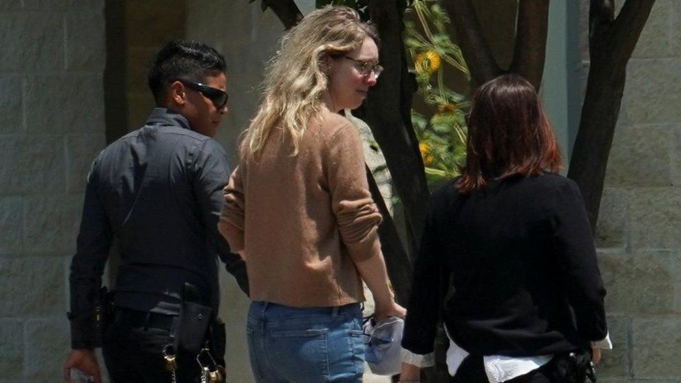 Theranos founder Elizabeth Holmes arrives to begin serving her prison sentence for defrauding investors in the failed blood-testing startup, at the Federal Prison Camp in Bryan, Texa