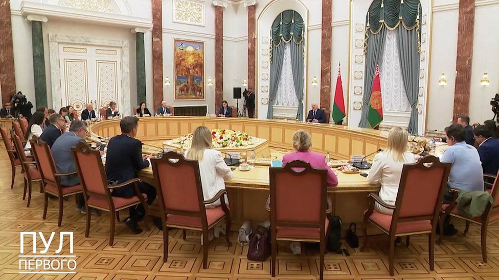 Steve Rosenberg (L by the door) was among a group of journalists who spent four hours with Mr Lukashenko