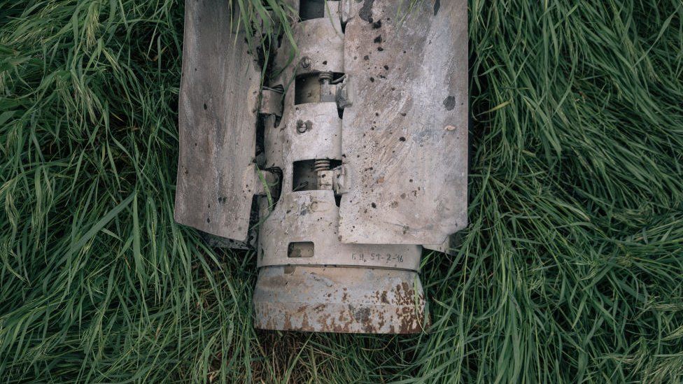 The remnants of a cluster bomb found in a field in Ukraine in April 2023