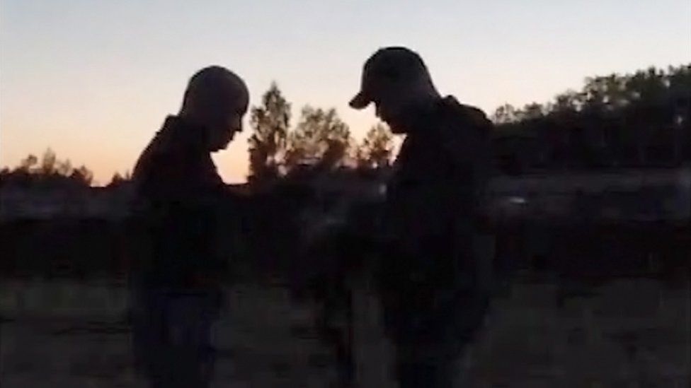 An enhanced grab from the video purporting to show Wagner leader Yevgeny Prigozhin and Wagner military chief Dmitry Utkin