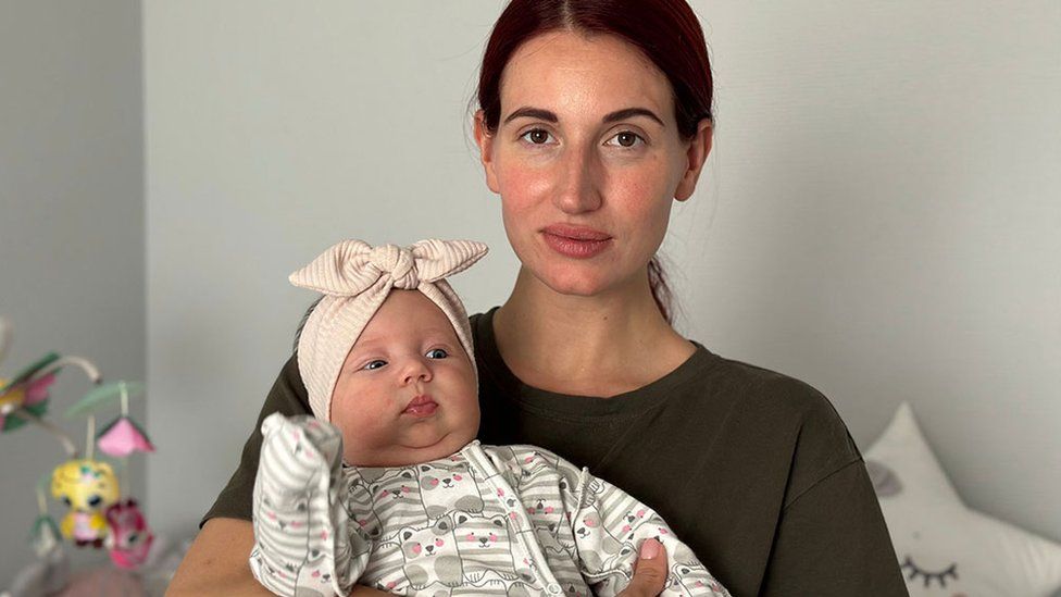 Evgeniya Emerald, pictured with her three-month-old baby, ran a jewellery business before the war