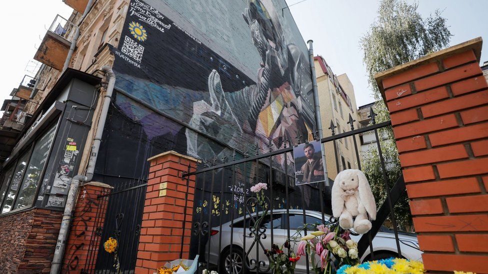 The pilot's picture was also put next to the "Ghost of Kyiv" mural in the Ukrainian capital